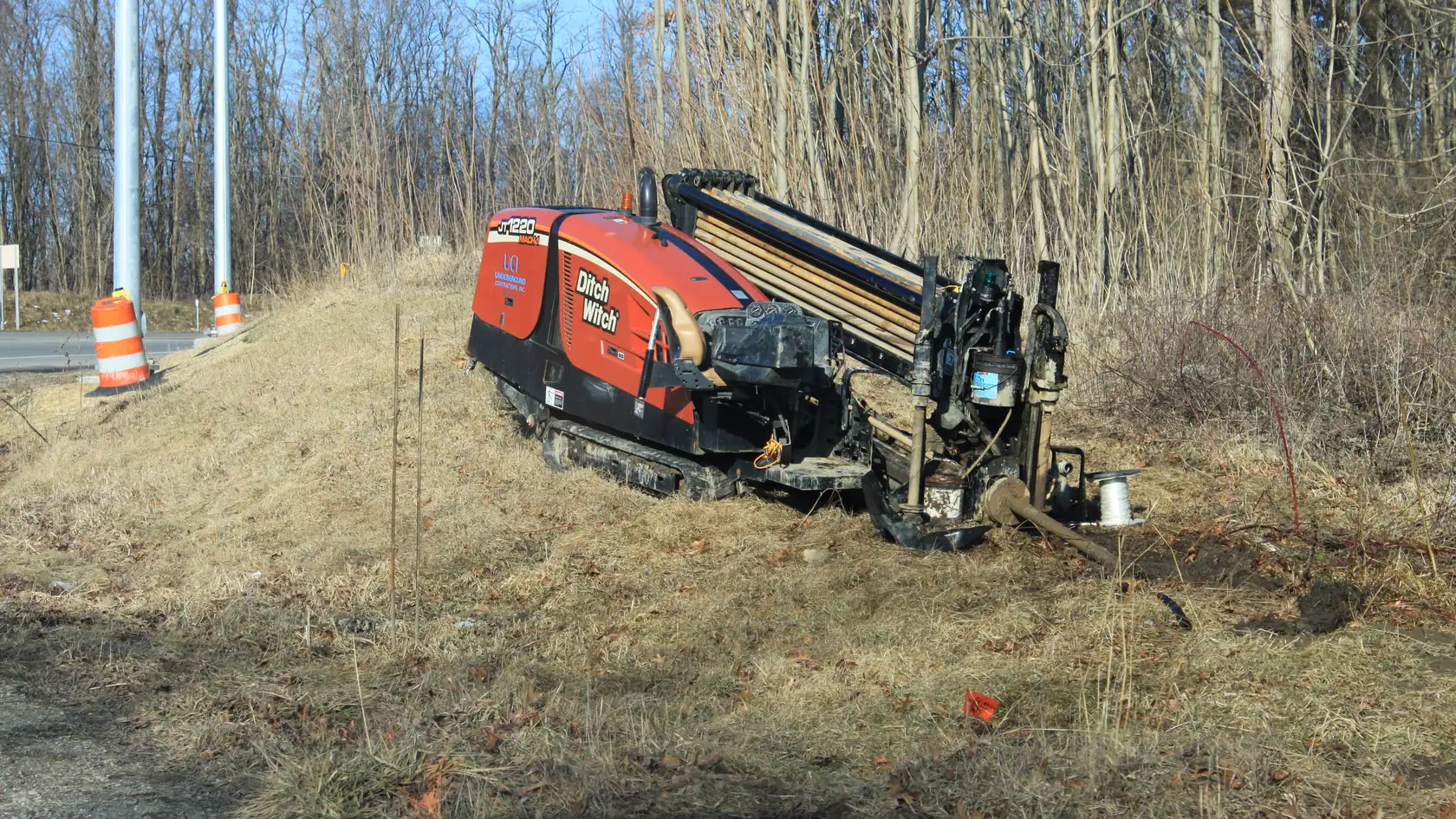 Horizontal directional drill set up for a road-side bore